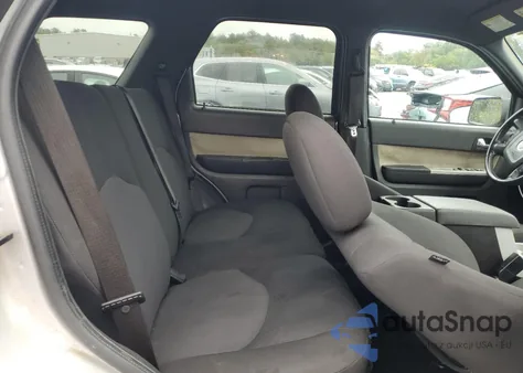 2009 Mercury Mariner из США, поврежденный, VIN 4M2CU91729KJ15969